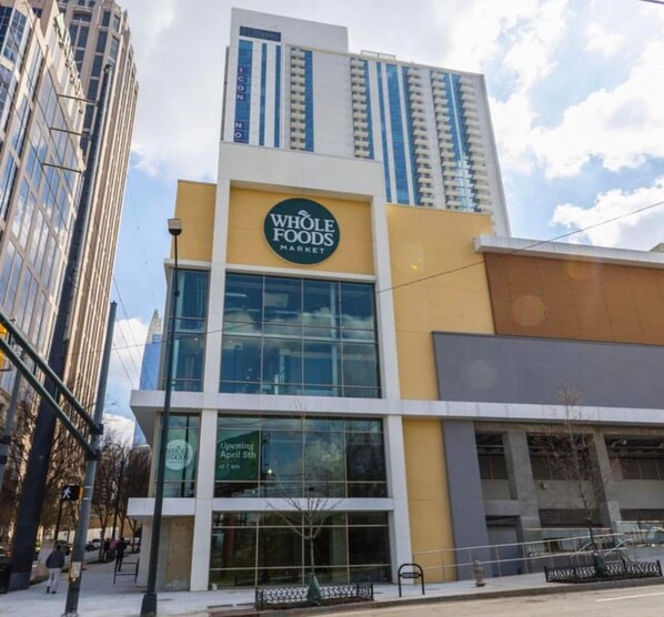 A Whole Foods Market building with large windows and a modern design.