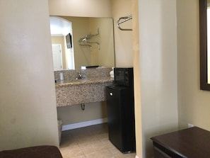Desk, laptop workspace, free WiFi, bed sheets