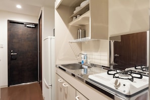 Super Bright & Eclectic 2 Floor Penthouse: Azabu | Private kitchen | Full-size fridge, microwave, stovetop, cookware/dishes/utensils - Dash Living Higashi Azabu (Tokyo)