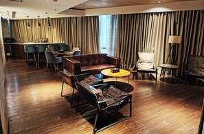 Presidential Suite, City View | Living area | 75-inch LED TV with cable channels
