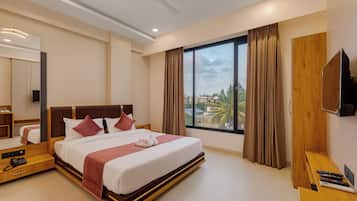 Deluxe Room AC | Soundproofing, free WiFi, bed sheets