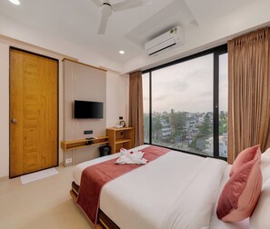 Deluxe Room AC | Soundproofing, free WiFi, bed sheets
