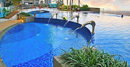 Le Tresor Benson Apartment at Surabaya Pakuwon Mall Free Wifi WaterHeater Balcon