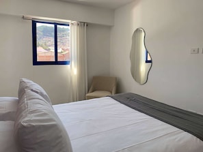 1 chambre, fer et planche à repasser, Wi-Fi, literie fournie