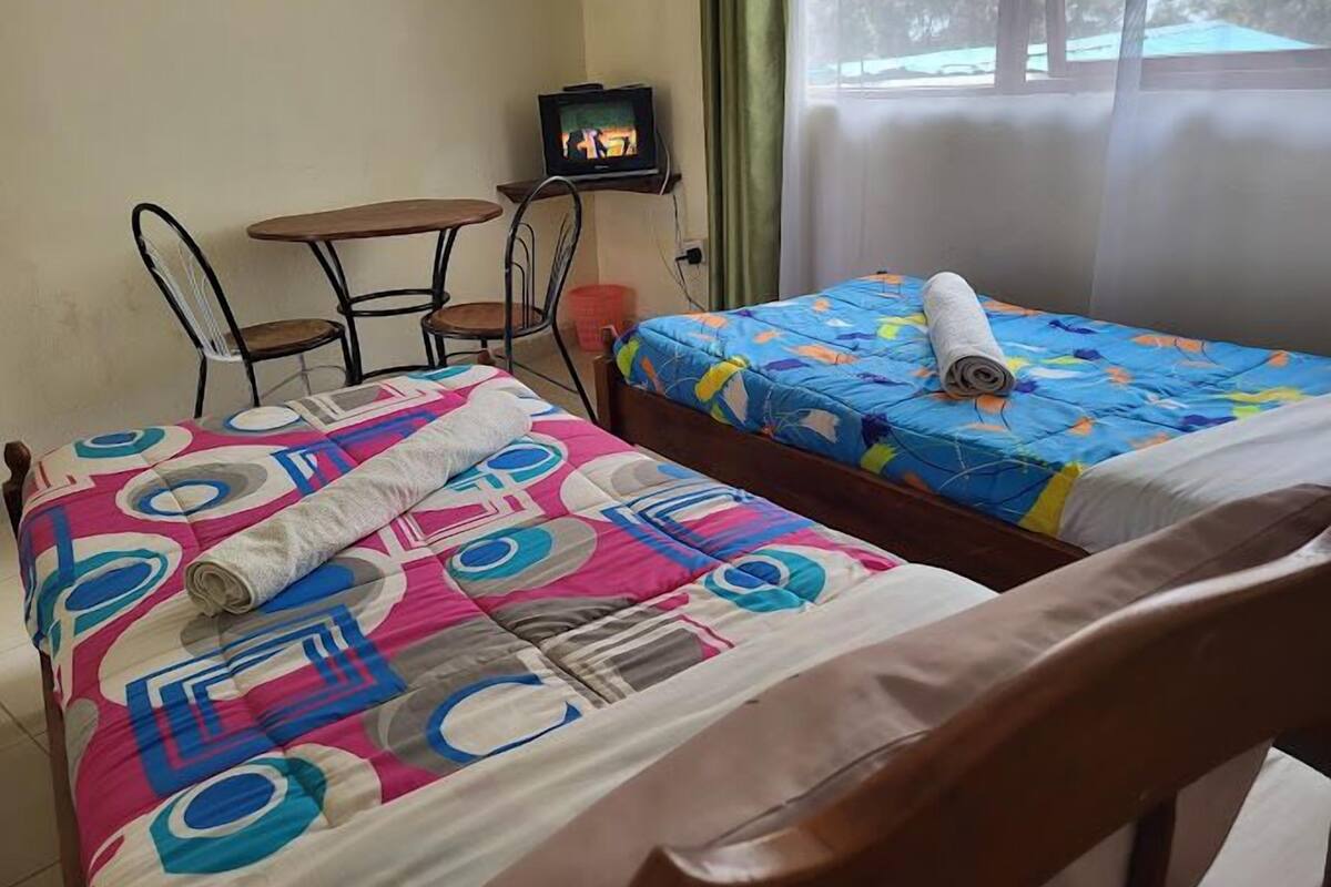 Standard Quadruple Room, Garden View | Free WiFi, bed sheets
