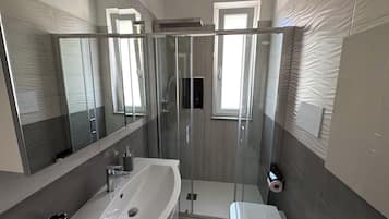 Hair dryer, towels, soap, toilet paper