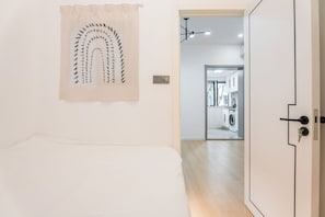 Suite, 2 chambres | Rideaux occultants, fer et planche à repasser, Wi-Fi gratuit