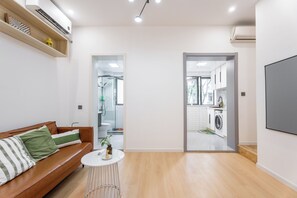 Suite, 2 chambres | Rideaux occultants, fer et planche à repasser, Wi-Fi gratuit