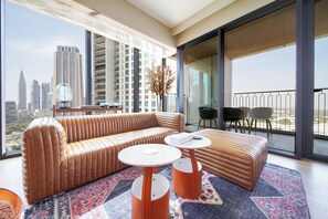 Luxury Apartment, Balcony, City View | Living area | Smart TV - PVH - 2BR Artistic Retreat in Downtown Views 2 (Dubai)