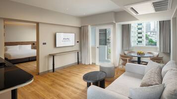 Family Suite | Living area | 50-inch LCD TV with cable channels