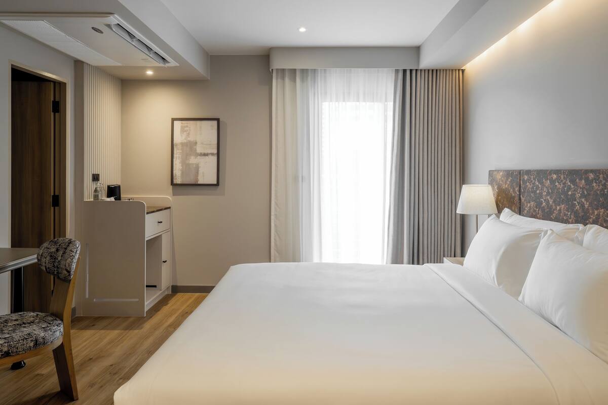 Superior Room | In-room safe, desk, blackout drapes, iron/ironing board