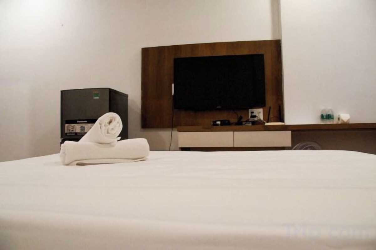 Hochwertige Bettwaren, Minibar, Schreibtisch