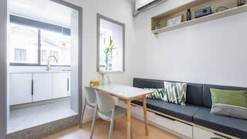 Suite, 2 Bedrooms | Living room | TV