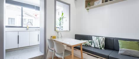 Suite, 2 Bedrooms | Living room | TV