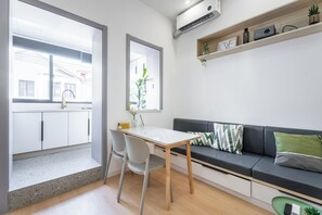 Suite, 2 Bedrooms | Living room | TV