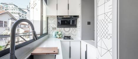 Suite, 2 Bedrooms | Private kitchen | Fridge, microwave, cookware/dishes/utensils, paper towels