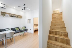 Suite, 2 Bedrooms | Blackout drapes, iron/ironing board, free WiFi