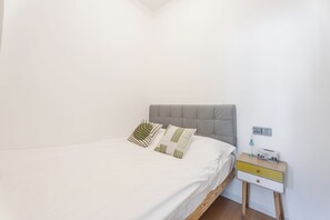 Suite, 2 Bedrooms | Blackout drapes, iron/ironing board, free WiFi