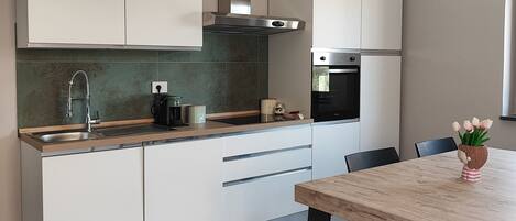 Forn, placa de cuina i rentaplats