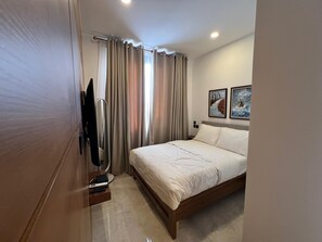 1 dormitorio, tabla de planchar con plancha, wifi