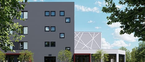 A modern building with a flat facade, multiple windows, and a geometric pattern on one side.