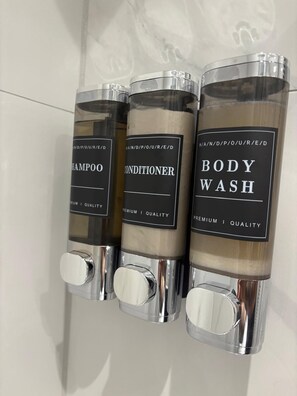 Shower, hair dryer, shampoo
