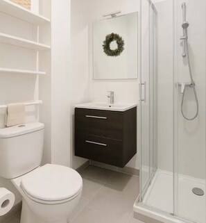Shower, hair dryer, towels, soap