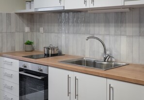 Oasis Apartment, Balcony, Partial Sea View | Private kitchen | Full-size fridge, microwave, oven, stovetop