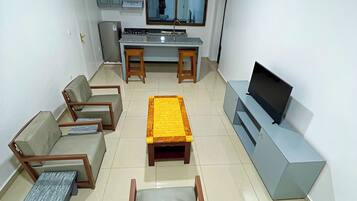 Deluxe Apartment, Balcony, City View | Living area