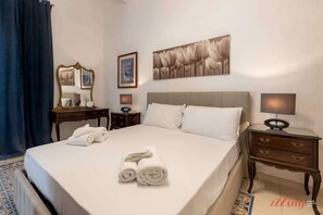 1 dormitorio, tabla de planchar con plancha, cuna de viaje y wifi