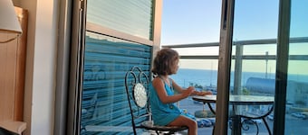 Charming 2-bedroom hotel in fabulous Herzliya with WiFi, AC, fitness room