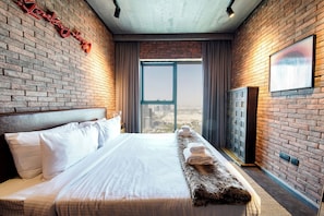 Apartment, Balcony, City View | Down duvets, in-room safe, individually decorated - PVH - Modern Edgy 1BR - Downtown Views (Dubai)