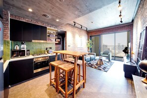 Apartment, Balcony, City View | Private kitchen | Full-size fridge, microwave, oven, stovetop - PVH - Modern Edgy 1BR - Downtown Views (Dubai)