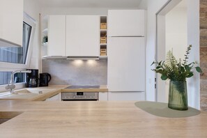 Réfrigérateur, four, plaque de cuisson, lave-vaisselle