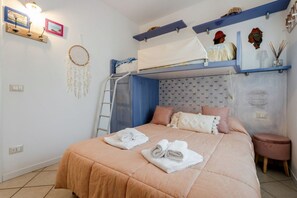 2 bedrooms, iron/ironing board, travel crib