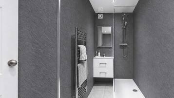 Shower, hair dryer, towels