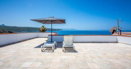 GuestHost - Cozy detached house of about 60 sqm, perfect for 4 people, located on the ground floor.The property is located in Torre dei Corsari, a charming village overlooking the splendid Costa Verde of Sardinia. In a few minutes by car you can reach so