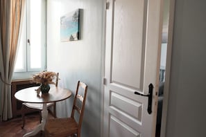 Suite, Courtyard View | In-room safe, iron/ironing board, free WiFi
