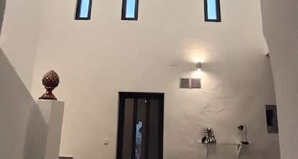 Right in the historic center, this house offers space and superb views.