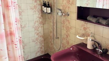 Hair dryer, towels, soap, shampoo