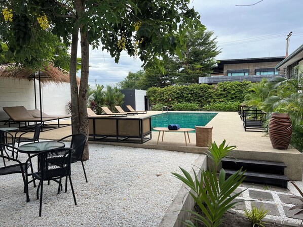 Outdoor pool, free pool cabanas, pool umbrellas