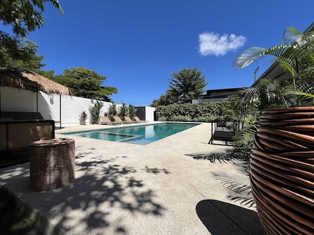 Outdoor pool, free cabanas, pool umbrellas