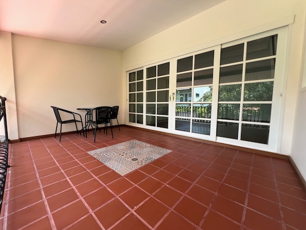 Apartamento superior, vistas al jardín | Terraza o patio