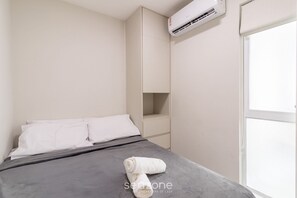 Apartemen Basic | 2 kamar tidur dan Wi-Fi gratis