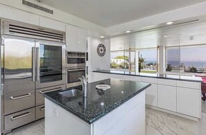 Microwave, dishwasher, coffee/tea maker, cookware/dishes/utensils