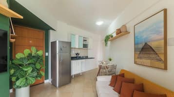Apartamento básico | Área de estar | Smart TV 32 polegadas com canais digitais
