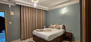 Singola Deluxe, vista giardino | Wi-Fi gratuito, lenzuola