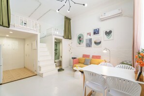 Suite, 2 Bedrooms | Living area | TV