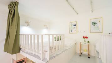 Suite, 2 Bedrooms | Blackout drapes, iron/ironing board, free WiFi, bed sheets