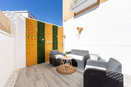 Terrace/patio. Apartment 'Calma Suite' with Private Garden, Wi-Fi and Air Conditioning